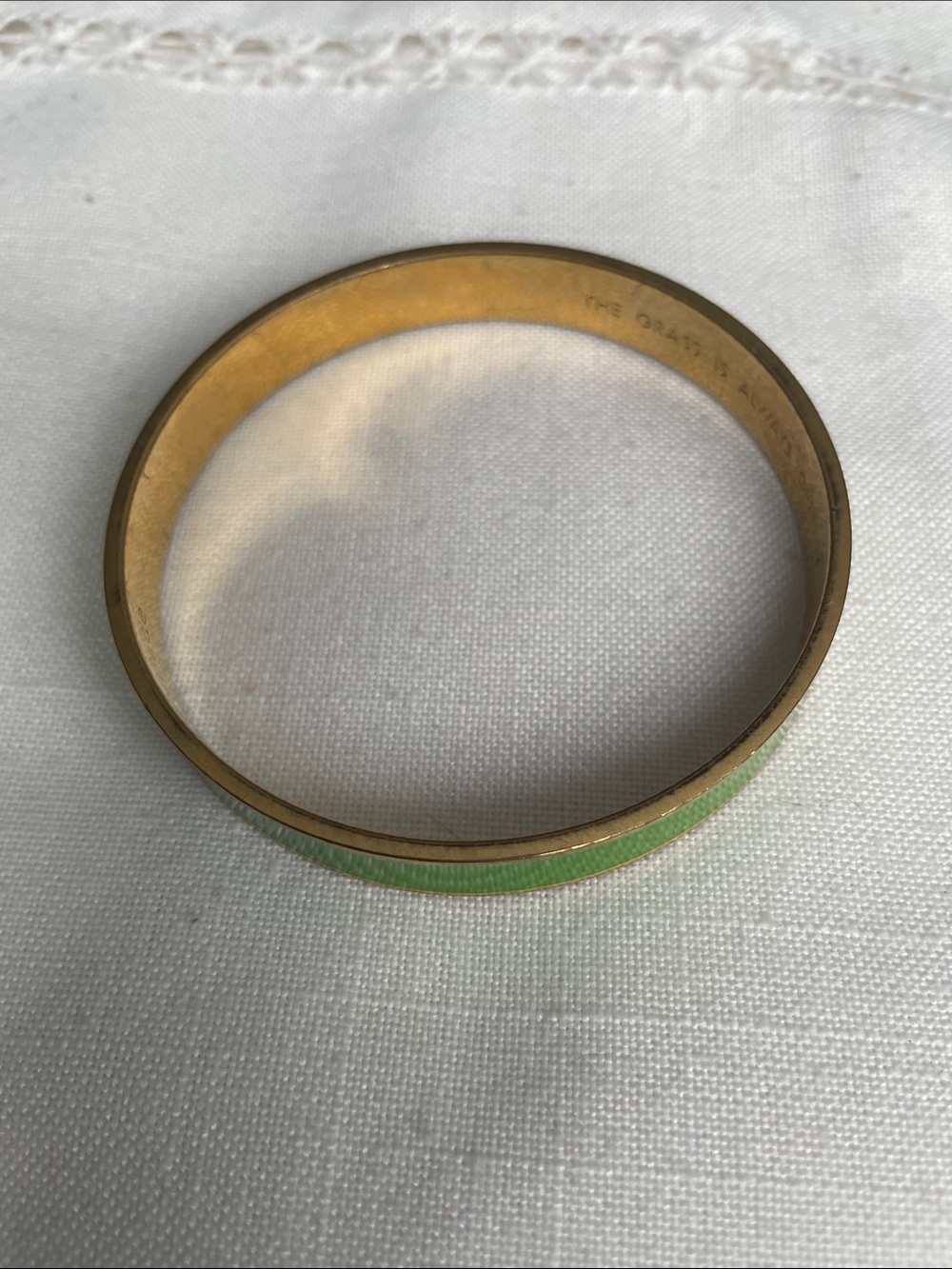 kate spade Gold-Tone Bangle with Green Enamel Inlay Rim Has some Scratches